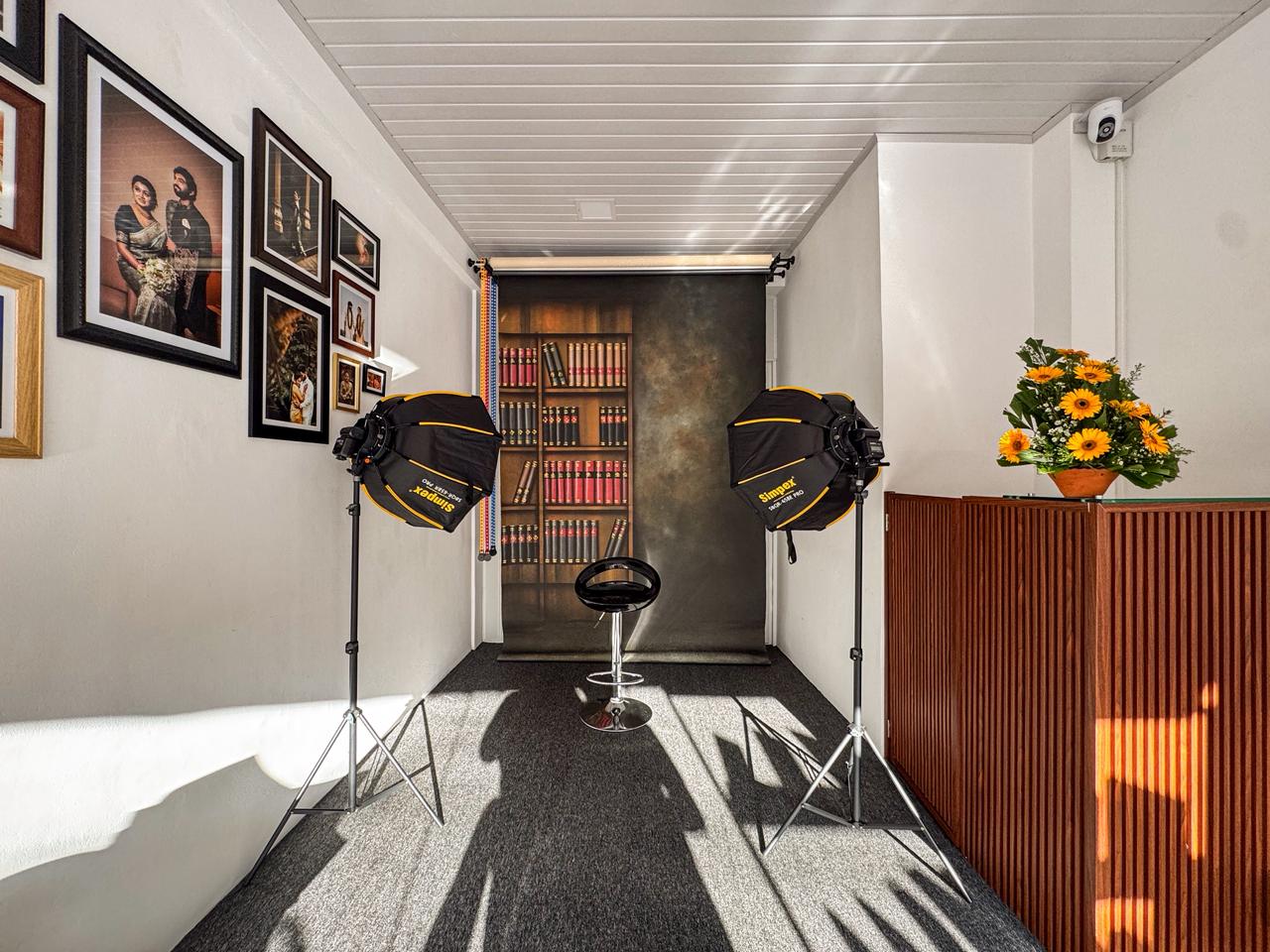 The shooting area at Photo Studio By RedONE, with backdrop and studio lighting