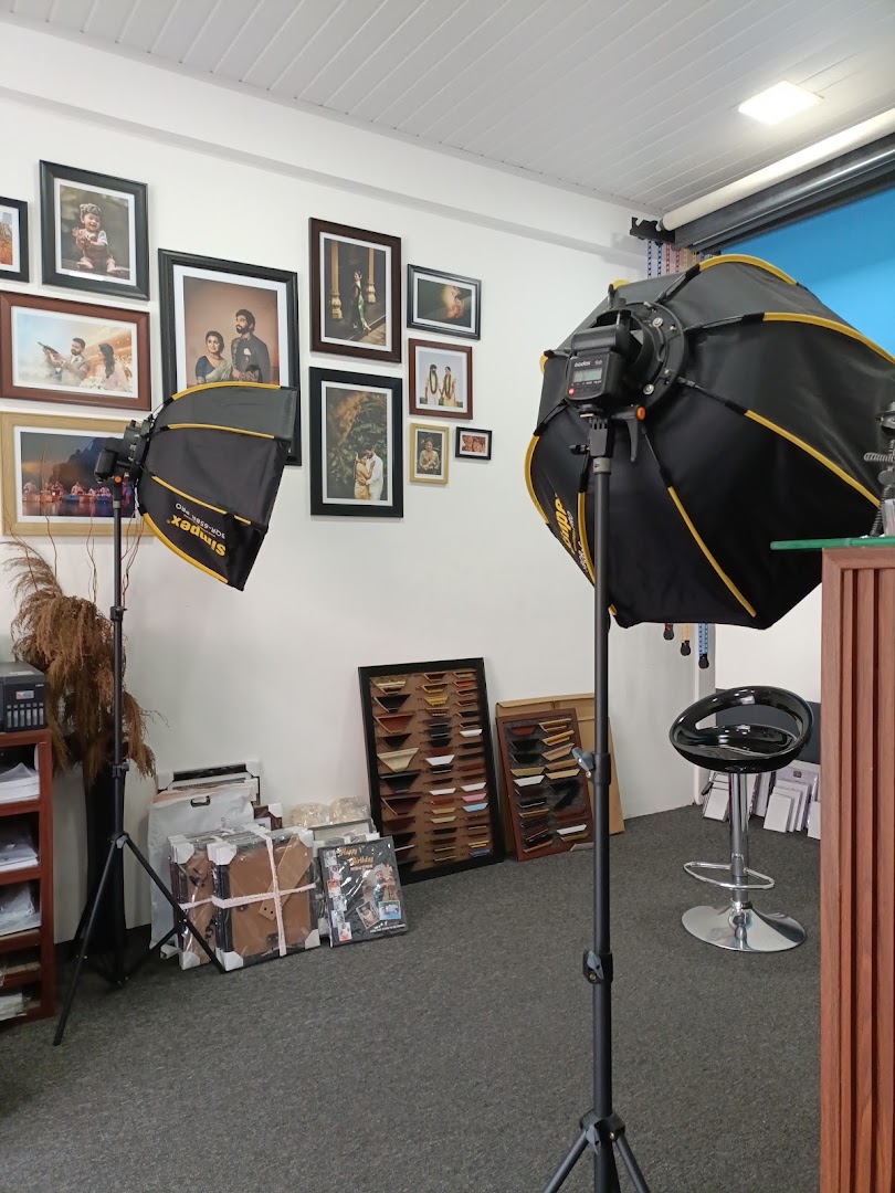 Studio lighting beside stacked frame stock